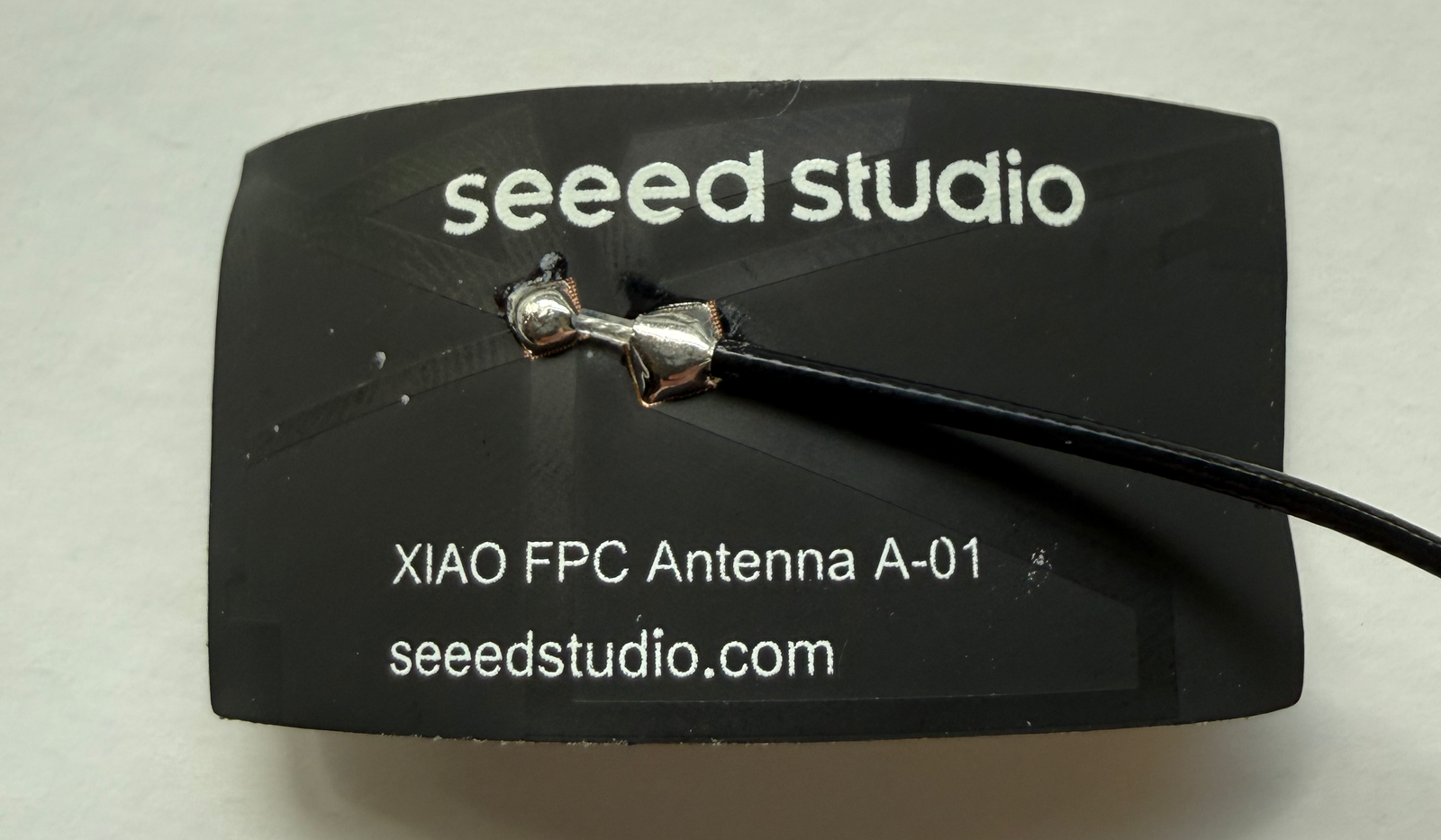 The antenna in the box: Seeed XIAO FPC Antenna A-01 with a u.FL pigtail